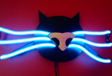electric kitty on red